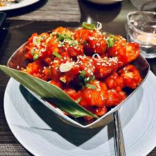 Tabla signature dishes Tandoori Lamb ChopsSea Bass TikkaGarlic Naan